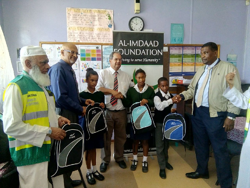 Team members together with circuit managers from the Department of Education were present for the distributions